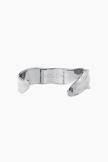 SOLCH ELOQUENCE Vintage & Classic. Crookedly folded cuff with a textured finish